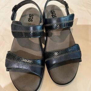 Brand new SAS Navy blue NUDU sandals. Size 9M